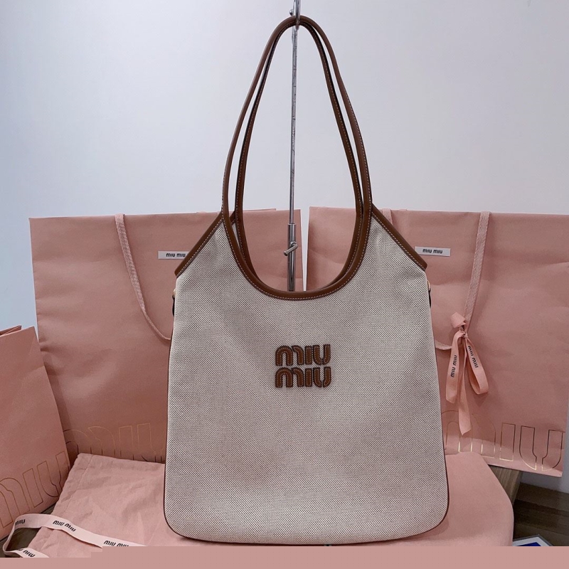 Ch*el top handle bags